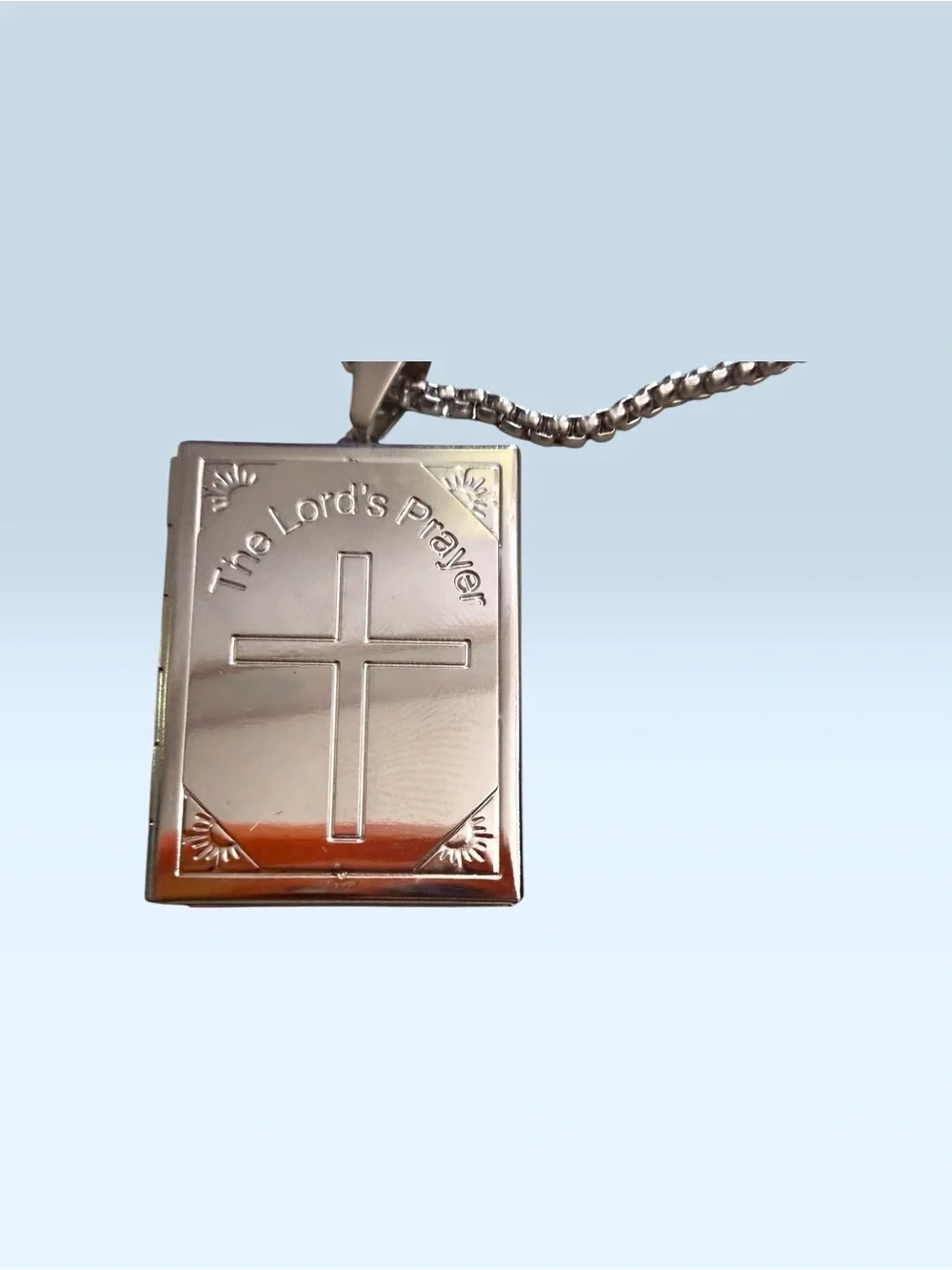 The Lord’s Prayer engraved locket and The Lord’s Prayer engraved ring. Stainless